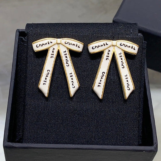 Chanel Black Letter Earrings with White Ribbon and Bow
